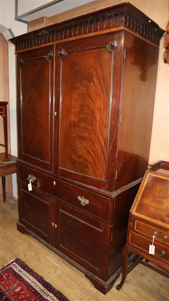 A George IV mahogany hanging wardrobe W.125cm